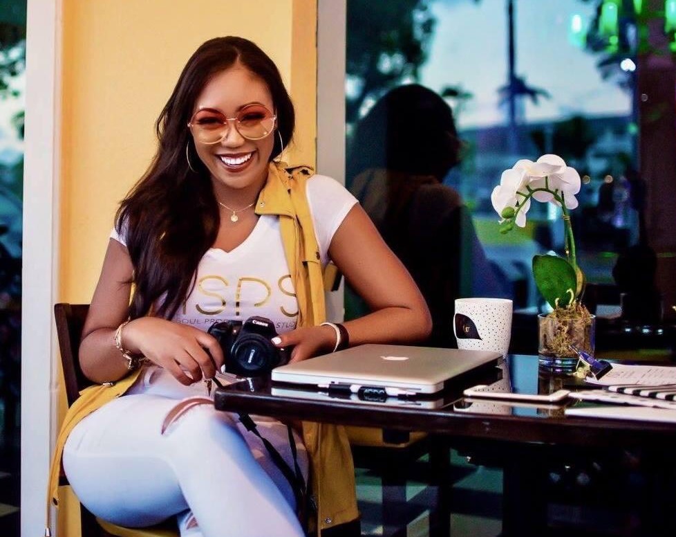 Aryanna Joy Roberts sitting at table