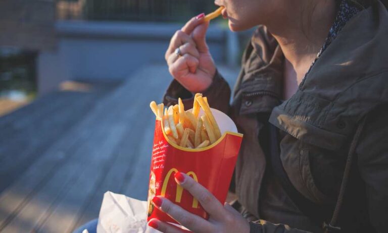 woman eating McDonald's fries